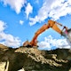 heavy civil construction safety with an excavator doing trench work